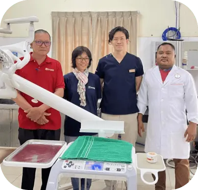 A photo of staff, dentists, and dental hygienists smiling and providing support in preventing tooth decay